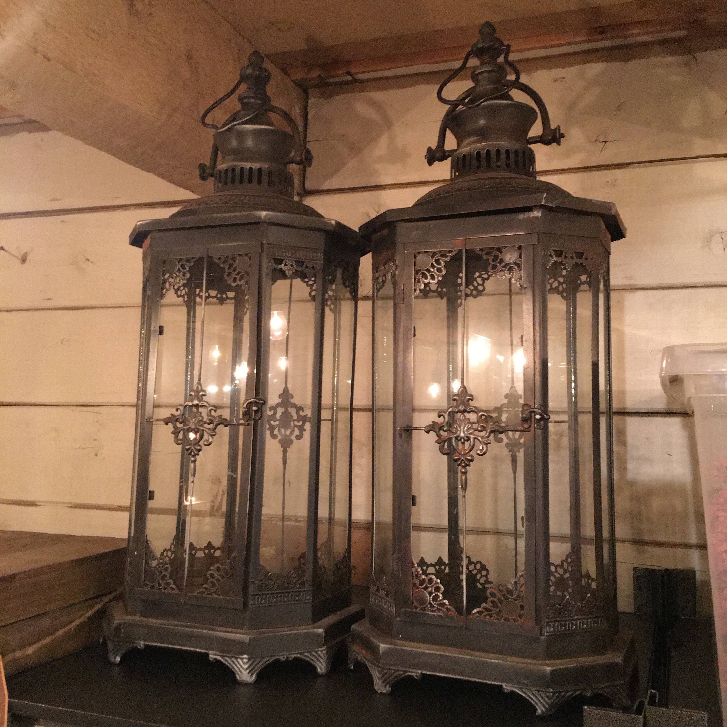 Three ft tall iron and glass antique lantern