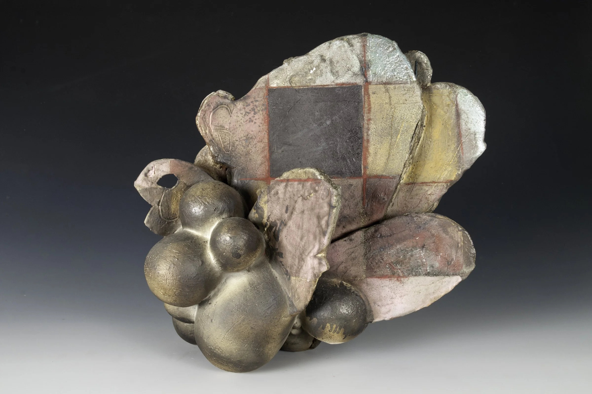     Post-baccalaureate,  R. James   — ( Untitled) Pixel Head  #2&nbsp;      Woodfired earthenware, wire. 13" x 13" x 9", 2012     