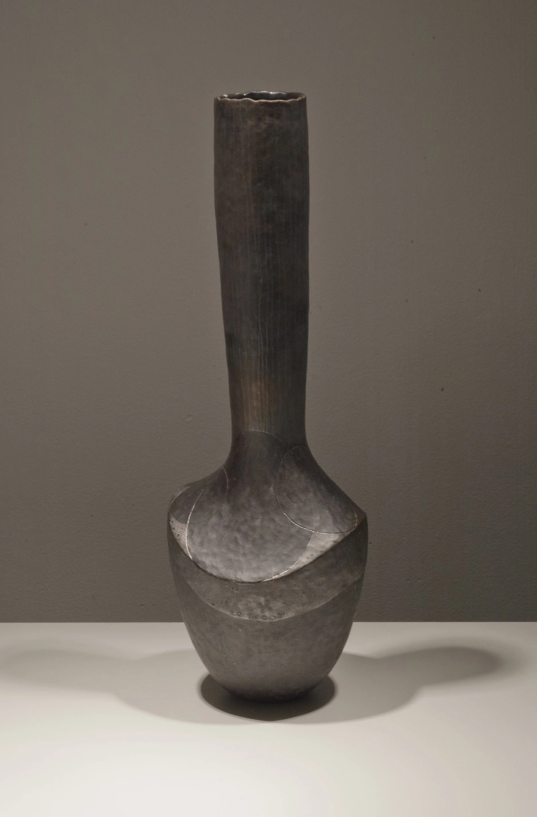     BFA,  E. Pechacek —  Tamped Vase       Stoneware. 20" x 6.5 "  x 6.5", 2012&nbsp;     