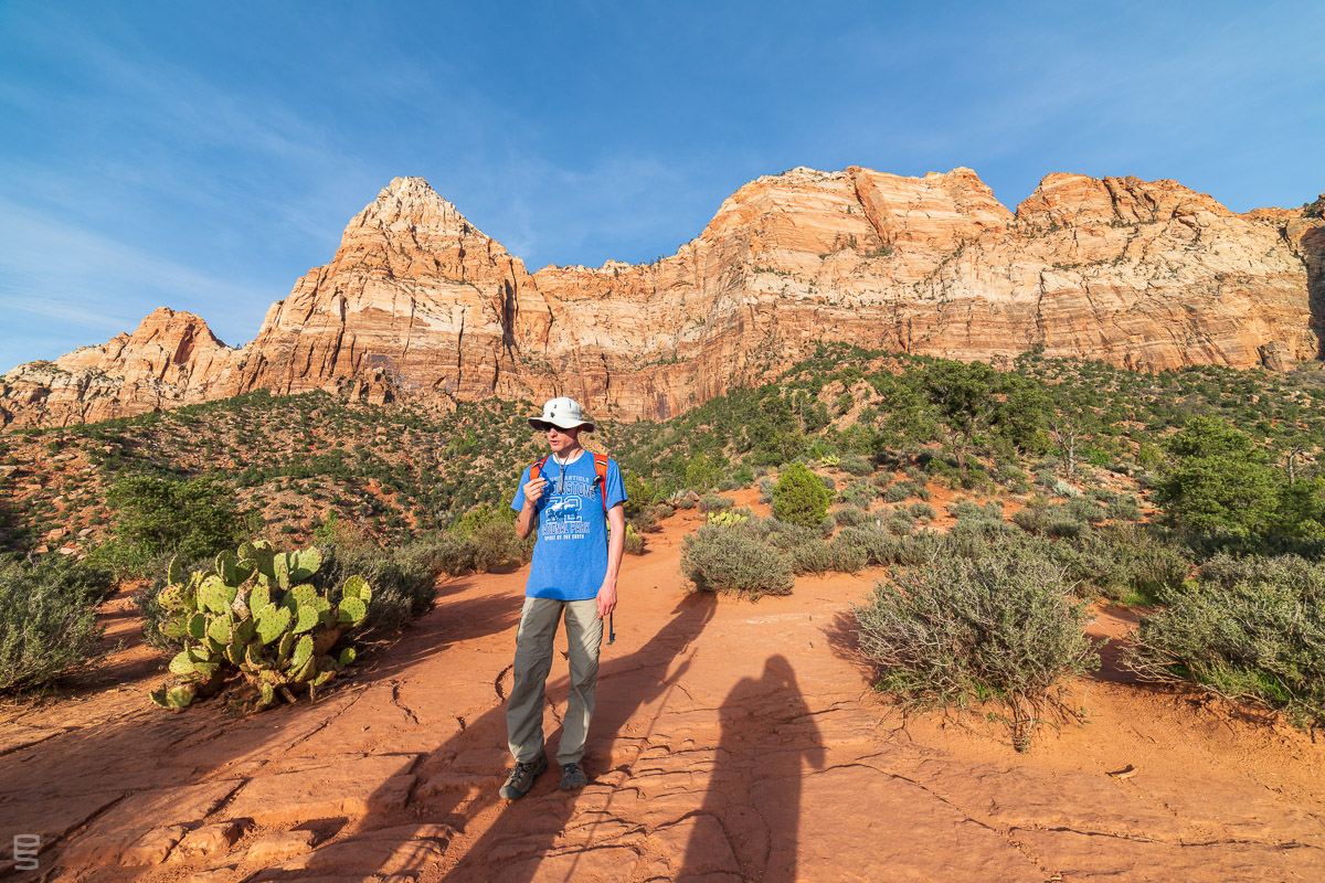 Pausing for some water during an evening hike up The Watchman, at Zion National Park. You can see my shadow as I take the picture.