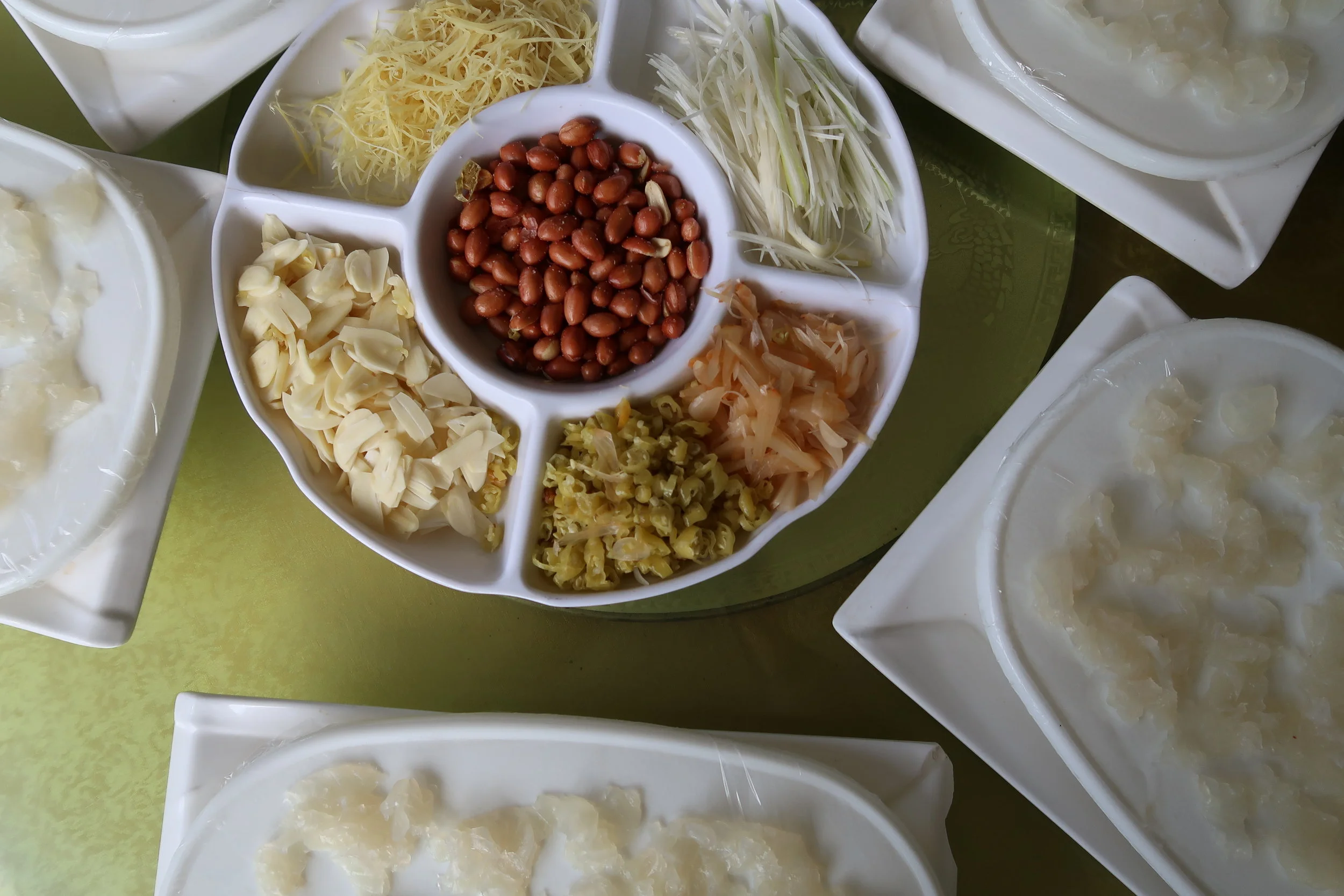  This is a bizarre memory. Went on a bike ride with a Hunan friend and an American friend who’d come to visit, and my Chinese friend suggested we stop at this roadside place for lunch. Long story short, we were offered seven different preparations of