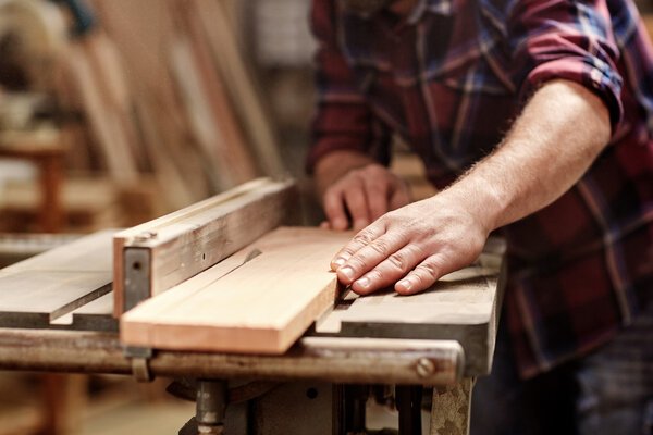 depositphotos_100906810-stock-photo-craftsman-cutting-plank-with-circular.jpg