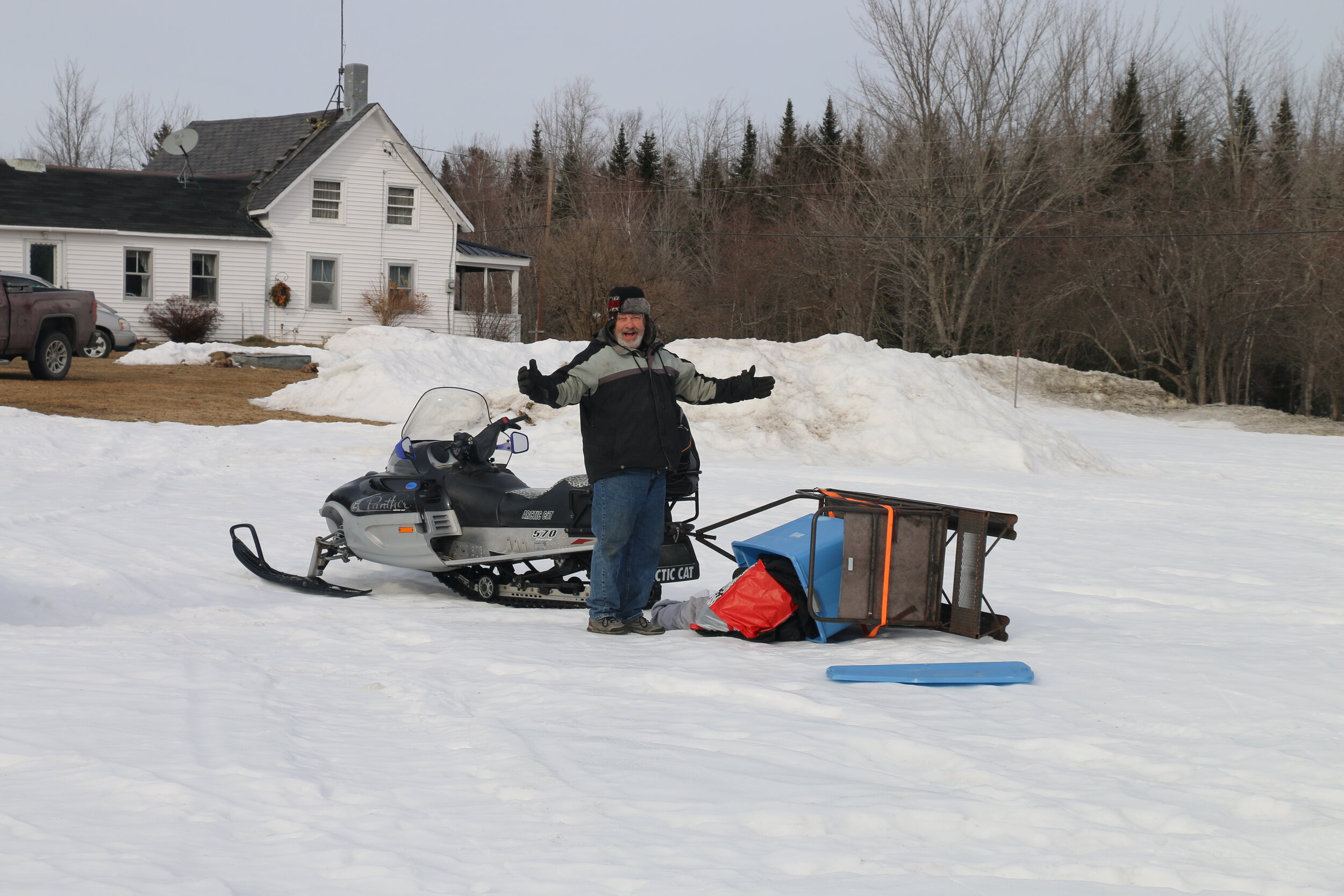   Bill wondering who flipped the toboggan over.  