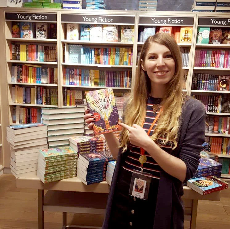Being goofy with my pile of signed (and doodled in) books at Foyles Charing Cross! (How do people make this look cool?)