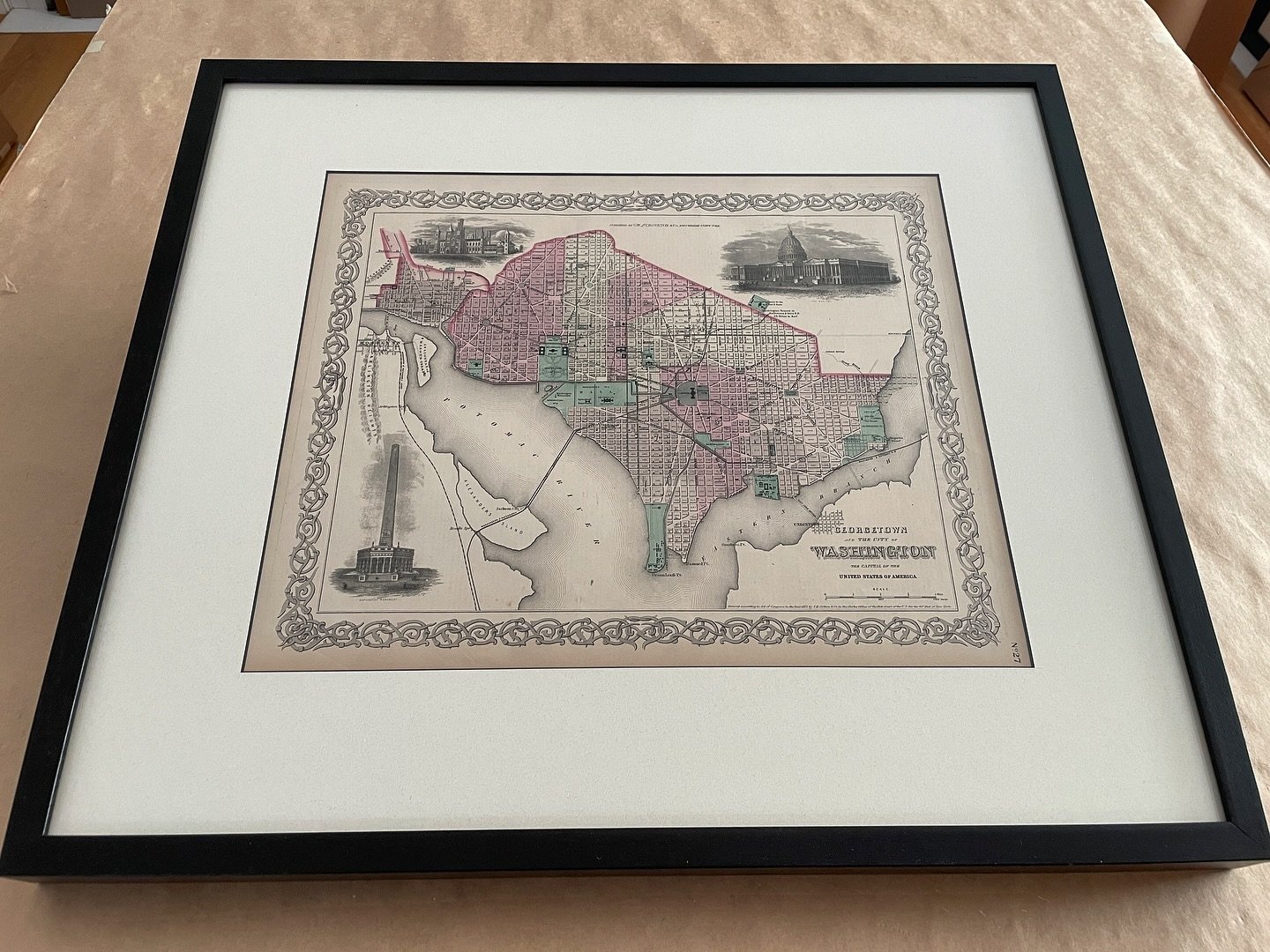 A beautiful old map of Georgetown &amp; Washington DC. 

I always like to start with the matting first. Find that foundation before looking at frames. I&rsquo;m always looking for something neutral on flows with the piece. A dark mat can really close