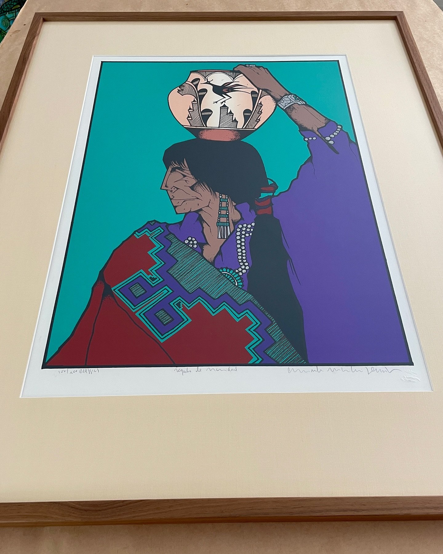 It was time to update this Amado Pena lithograph. Picked up in Santa Fe and framed many years ago, she needed a little make over. 

Previously framed with a black silk wrapped mat and a chunky high gloss black frame. She had found a new spot over a c