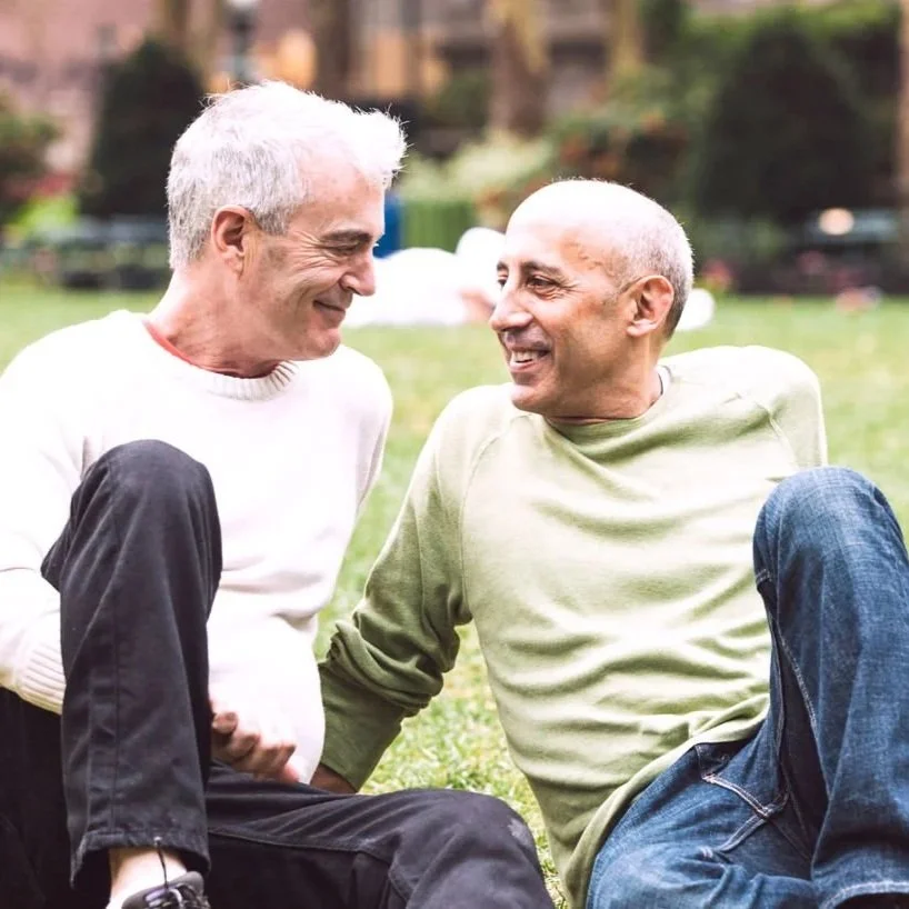 two old males smiled at each other