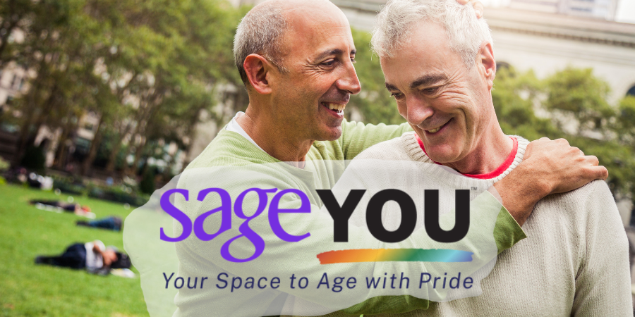 Two older men embracing, with the headline “Sage YOU, your space to age with pride.”