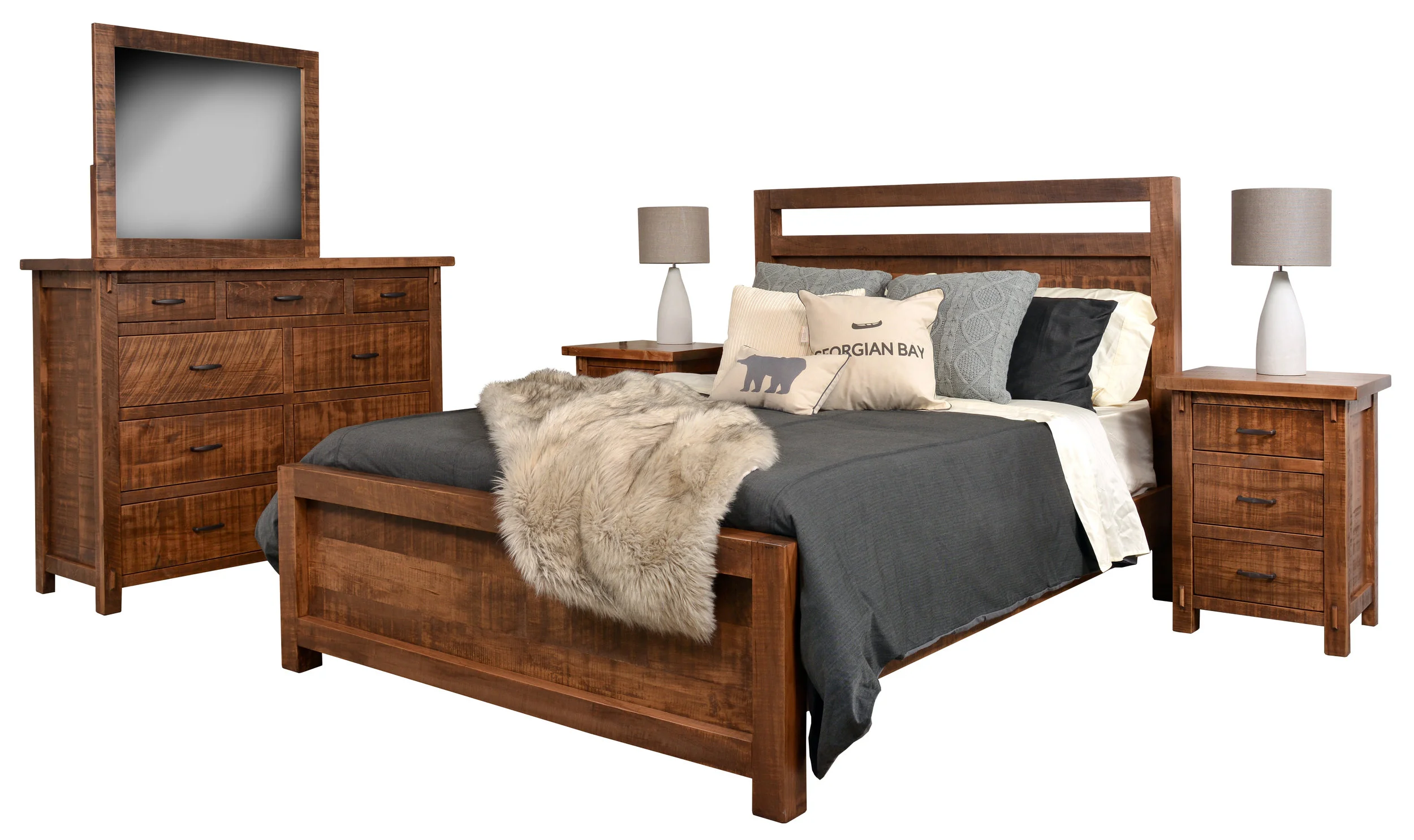 Handcrafted from rough sawn wormy maple. Available with soft close undermount or full extension side mount drawer slides.1-1/2” thick tops. This collection is shown in a ‘Fruitwood’ finish. This bed includes 4 wood slats with centre supports, suitable for a box spring and mattress combination.