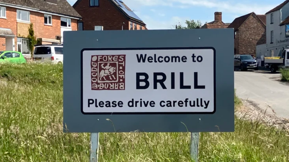 Photo of 'Welcome to Brill' road sign.
