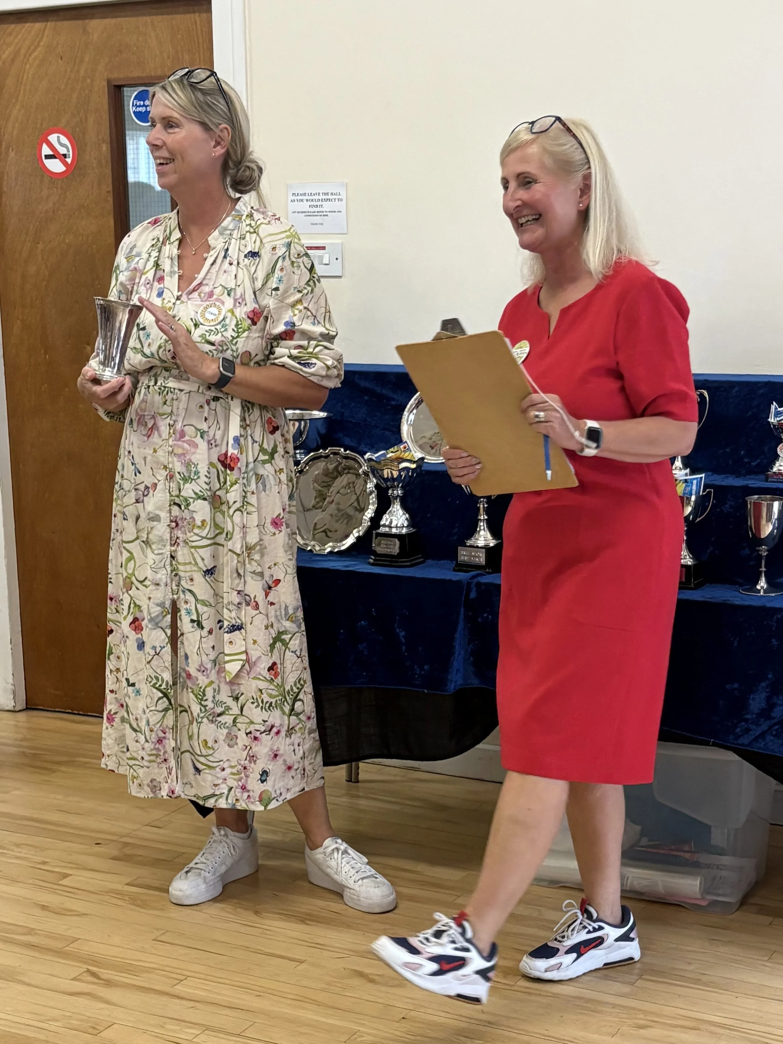 Photo of two women presenting prizes