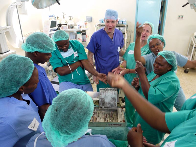  An energetic group teaching session with the theatre staff of Nanyuki Hospital, teaching them how to assemble and use orthopaedic surgical instruments that have been donated. 