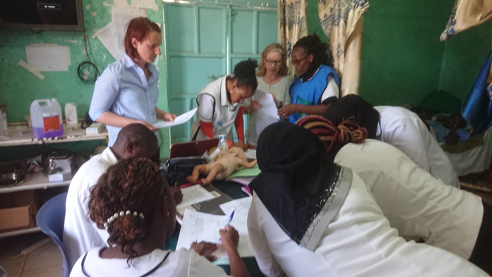  Lizzie and Jacq from the UK team facilitating a partogram workshop 'live' on the ward with maternity staff at Marsabit Hospita 