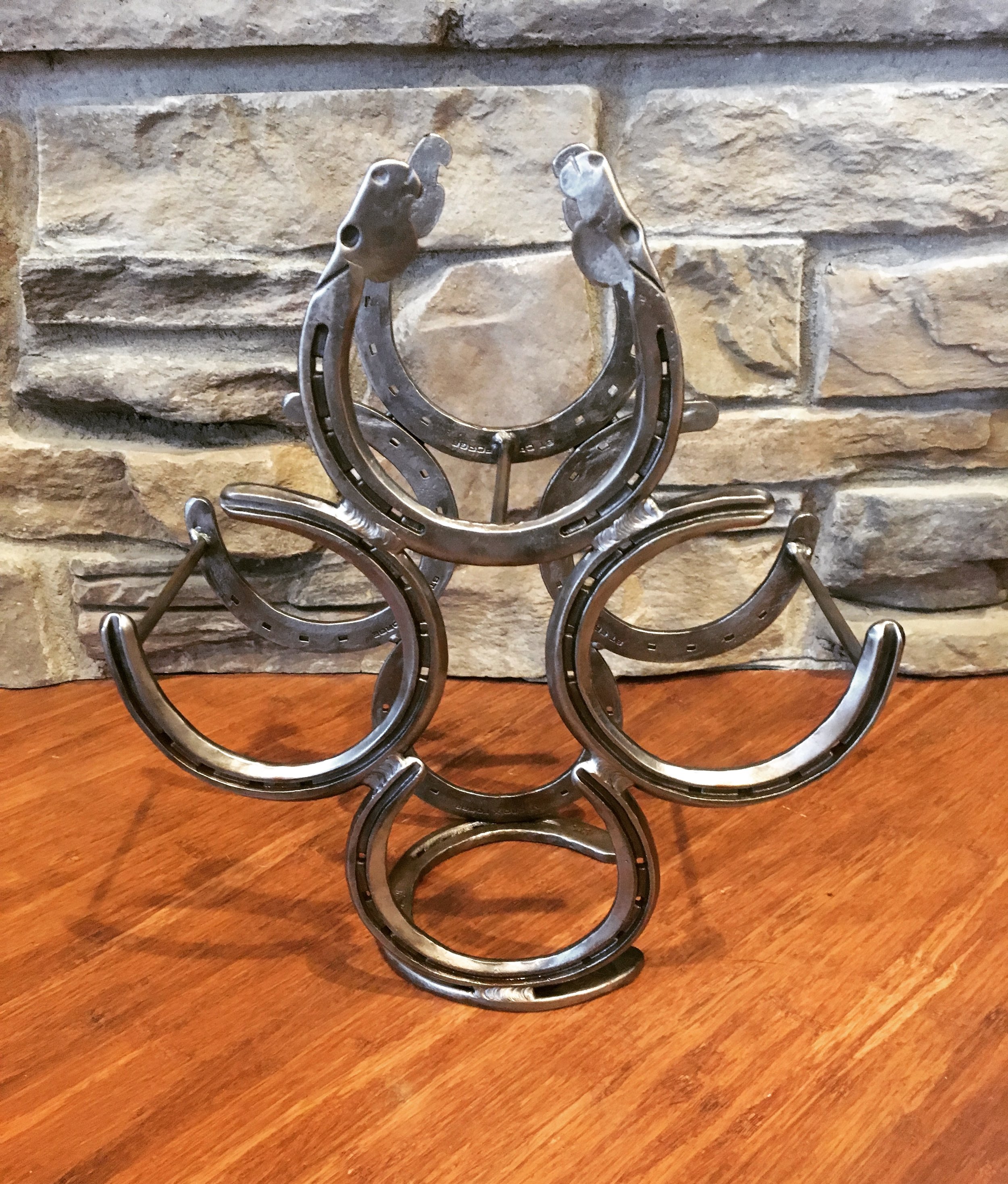 Four bottle with horseheads