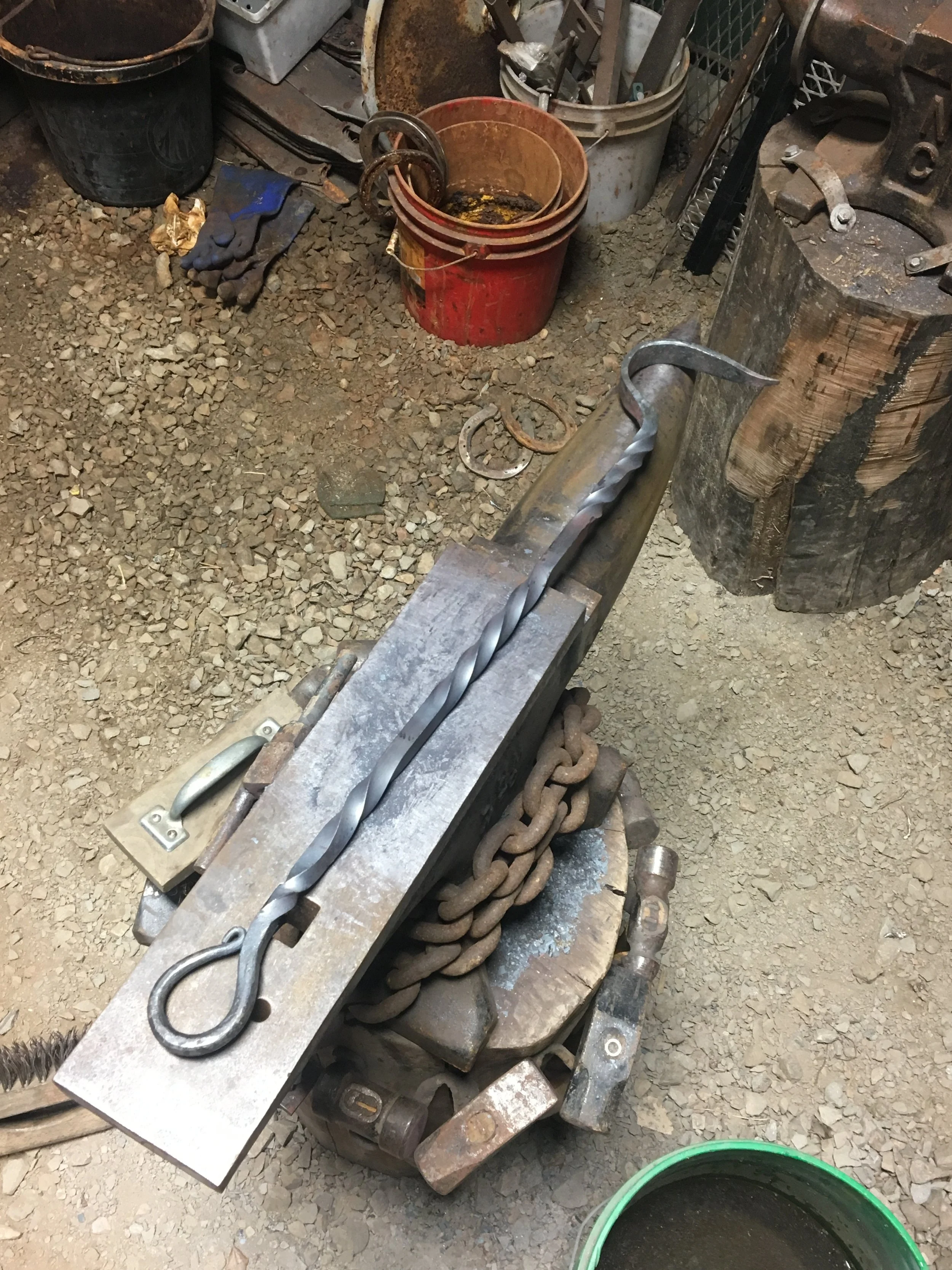 Twisted handle fire poker