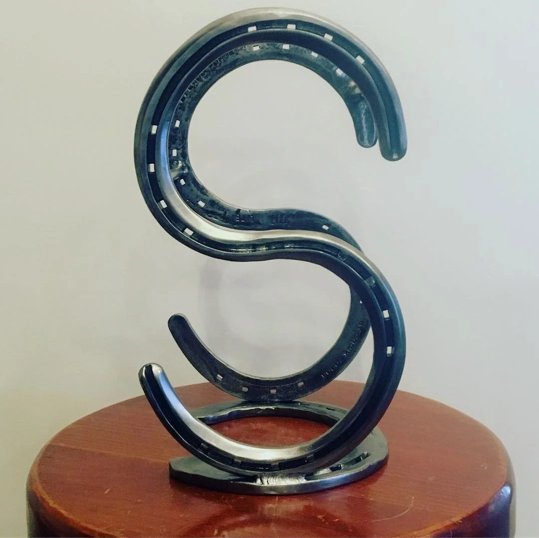 "S" makes a perfect letter for a wine rack