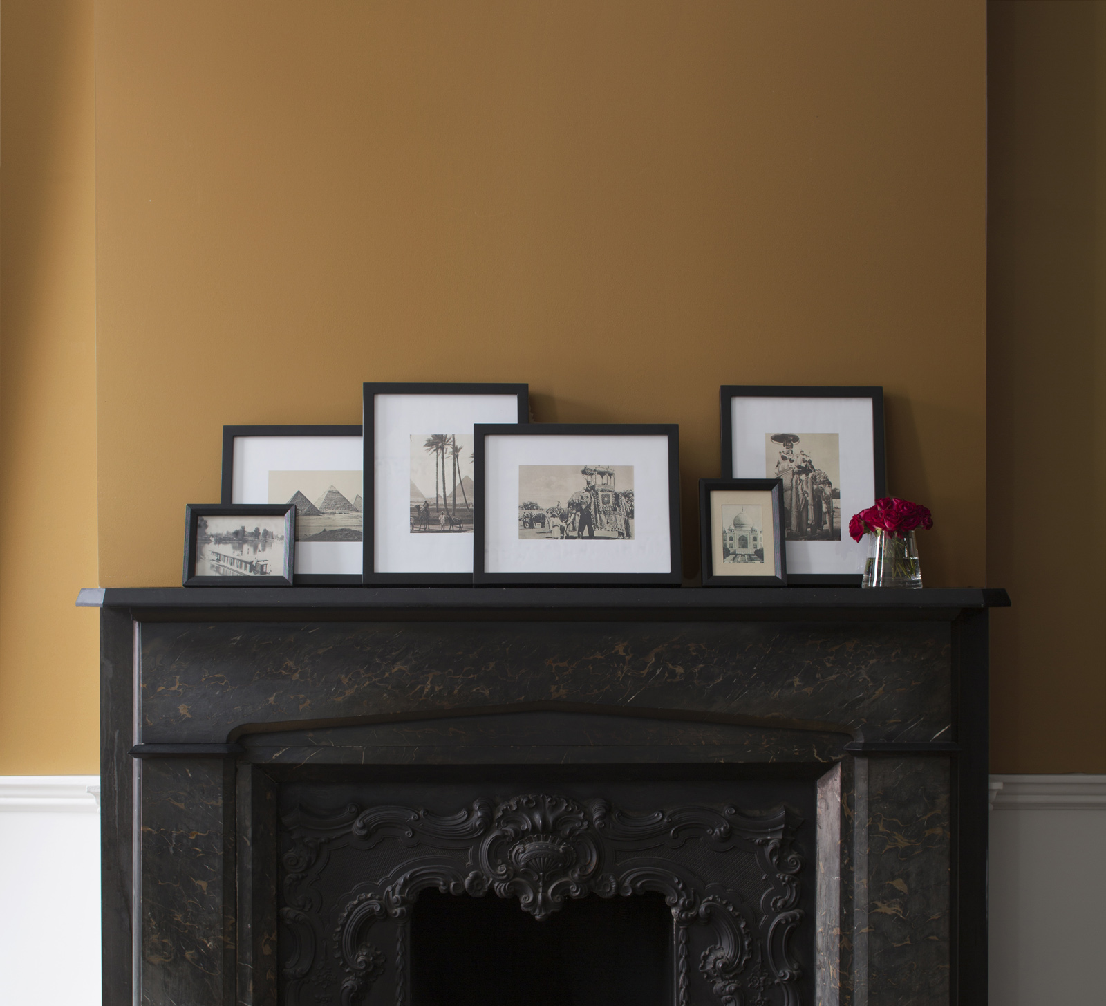 Black_Fireplace_with_Gold_Wall.jpg