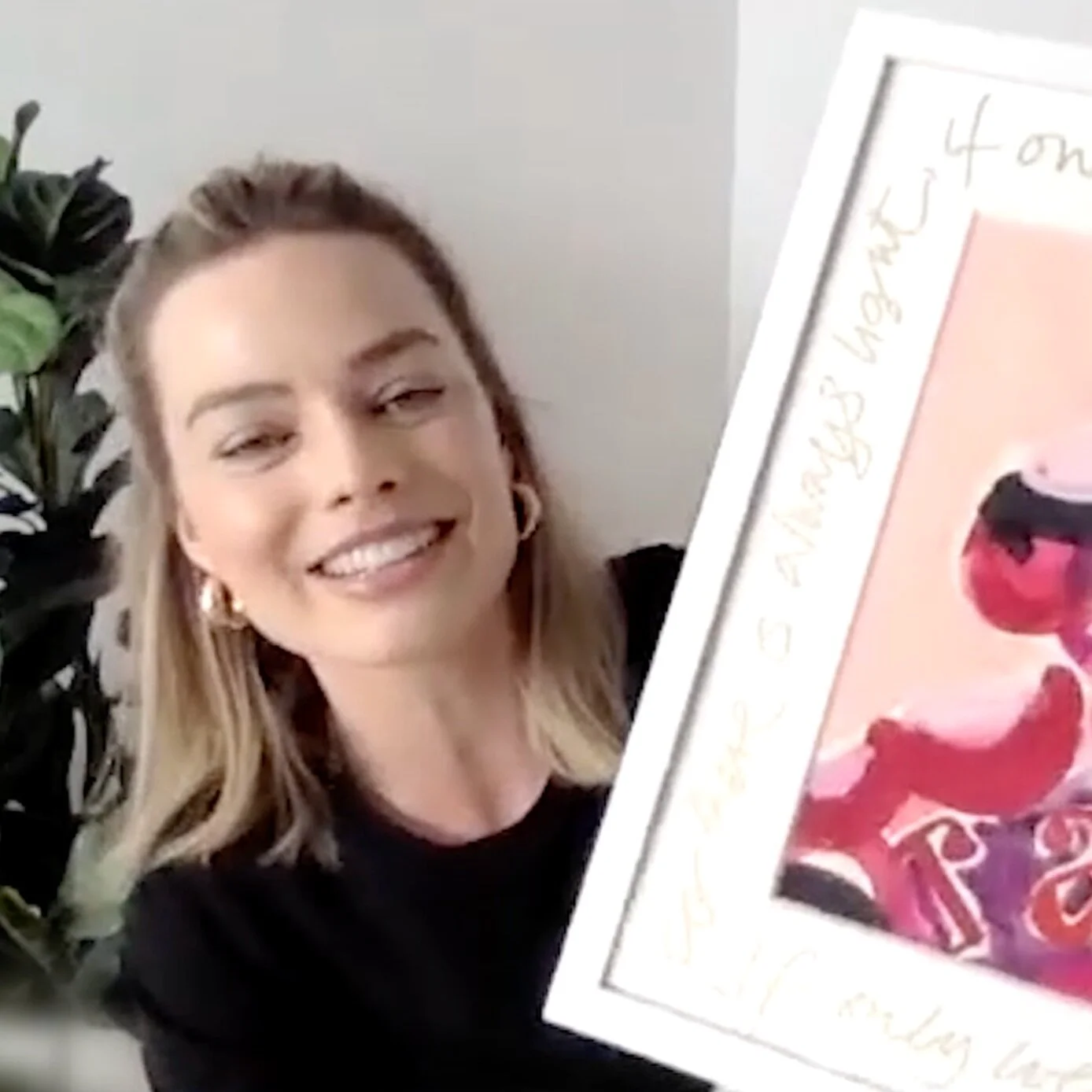 Margot Robbie shocks disability advocate Emily Dash with a surprise Zoom call... before sharing her RAD Impact Award with her