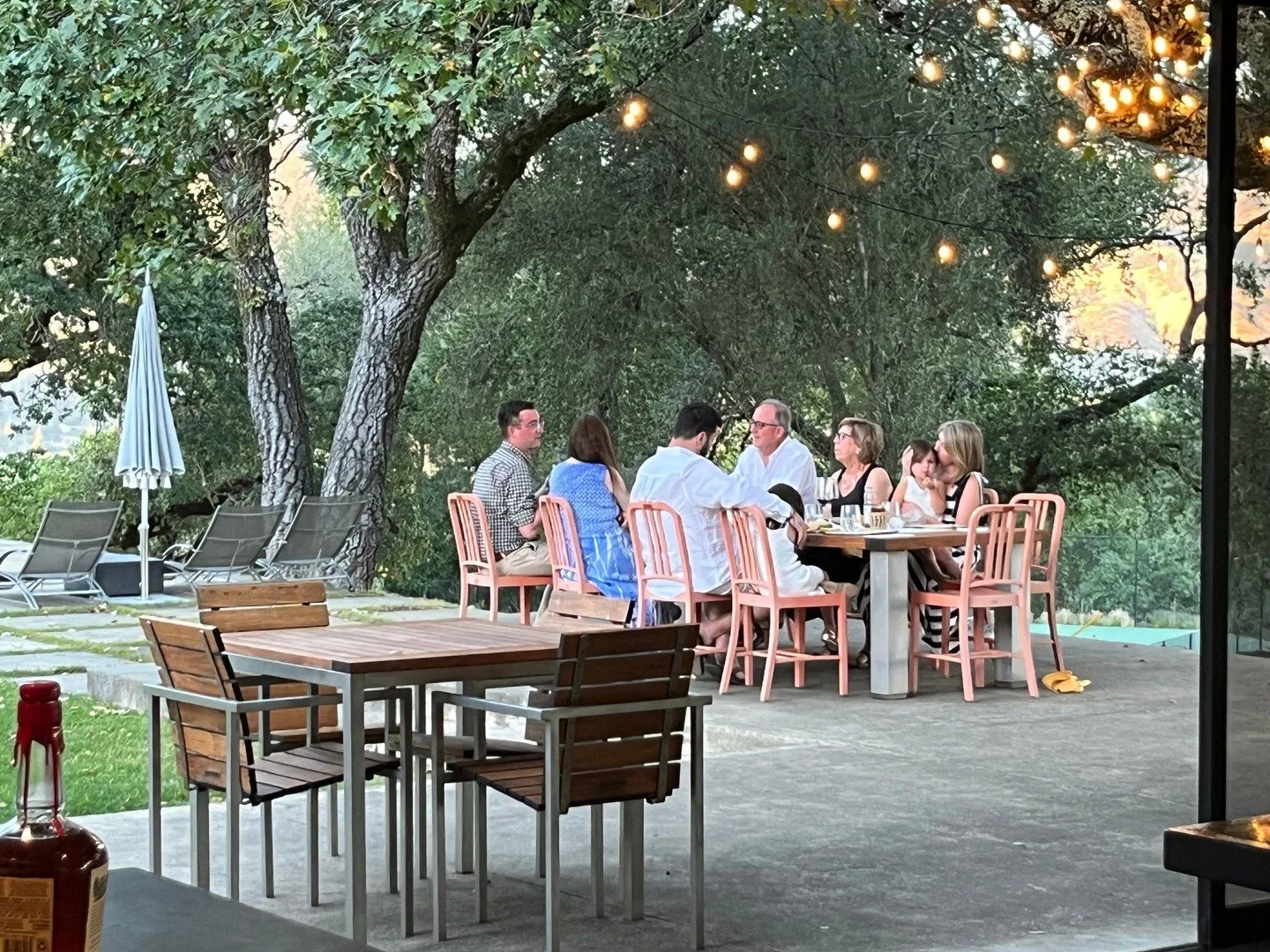 Six people around one table. Three generations actually talking. Zero phones out.
This is what happens when you trade the typical Wine Country itinerary for something real—a private chef experience at your vacation home where your chef becomes