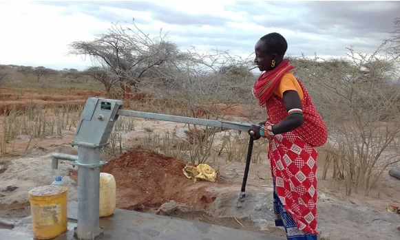 WomanPumpingWater.jpg