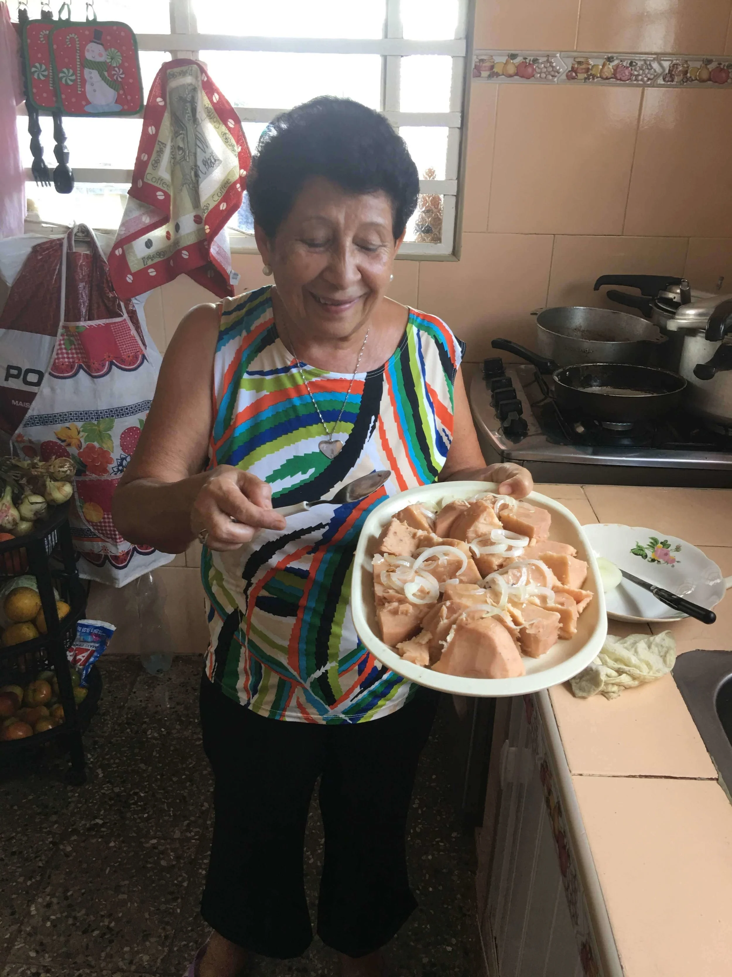 Tio Claudina serving up the best malanga!