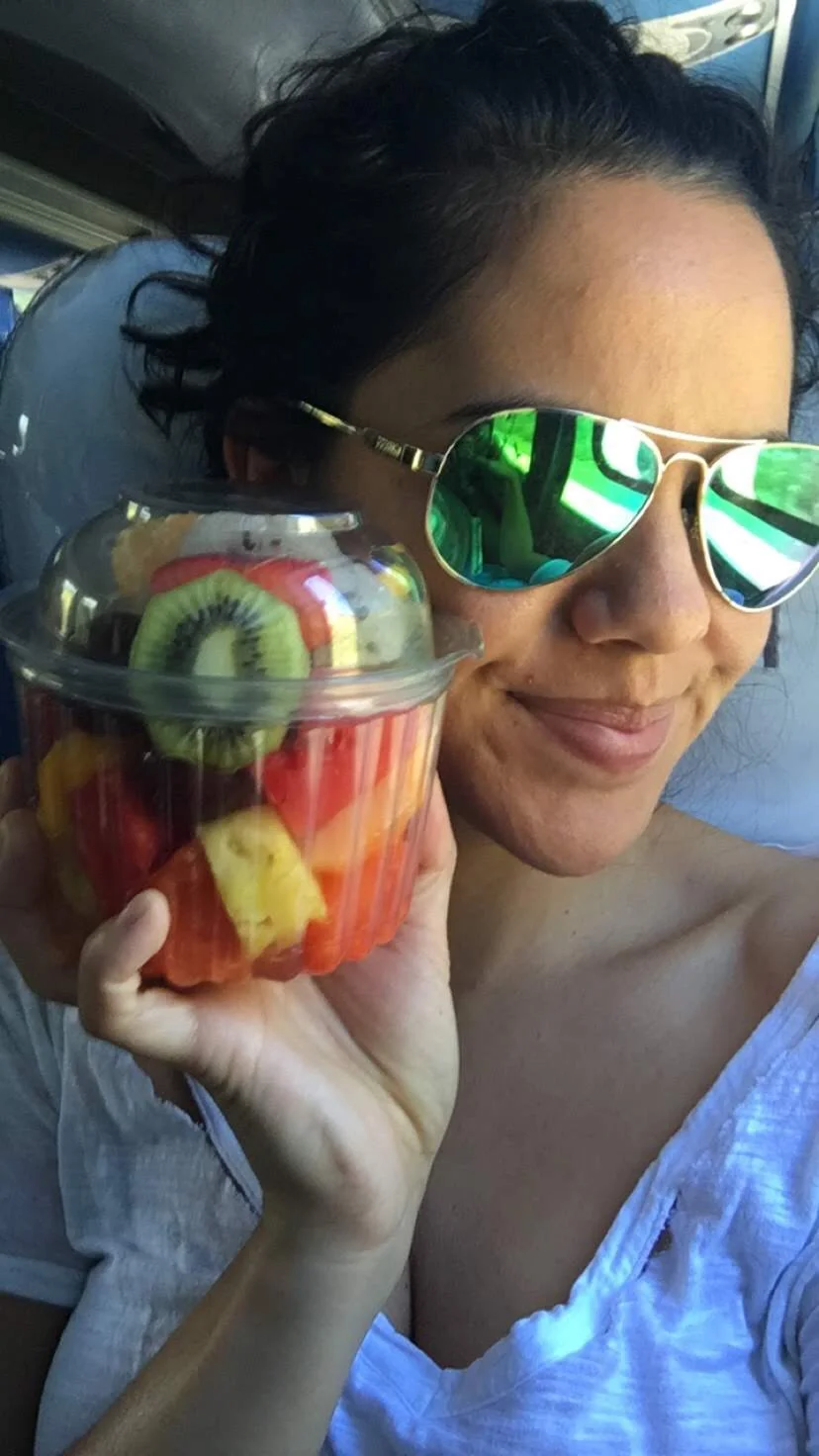 Munching on my daily medicine on a local bus in Ecuador