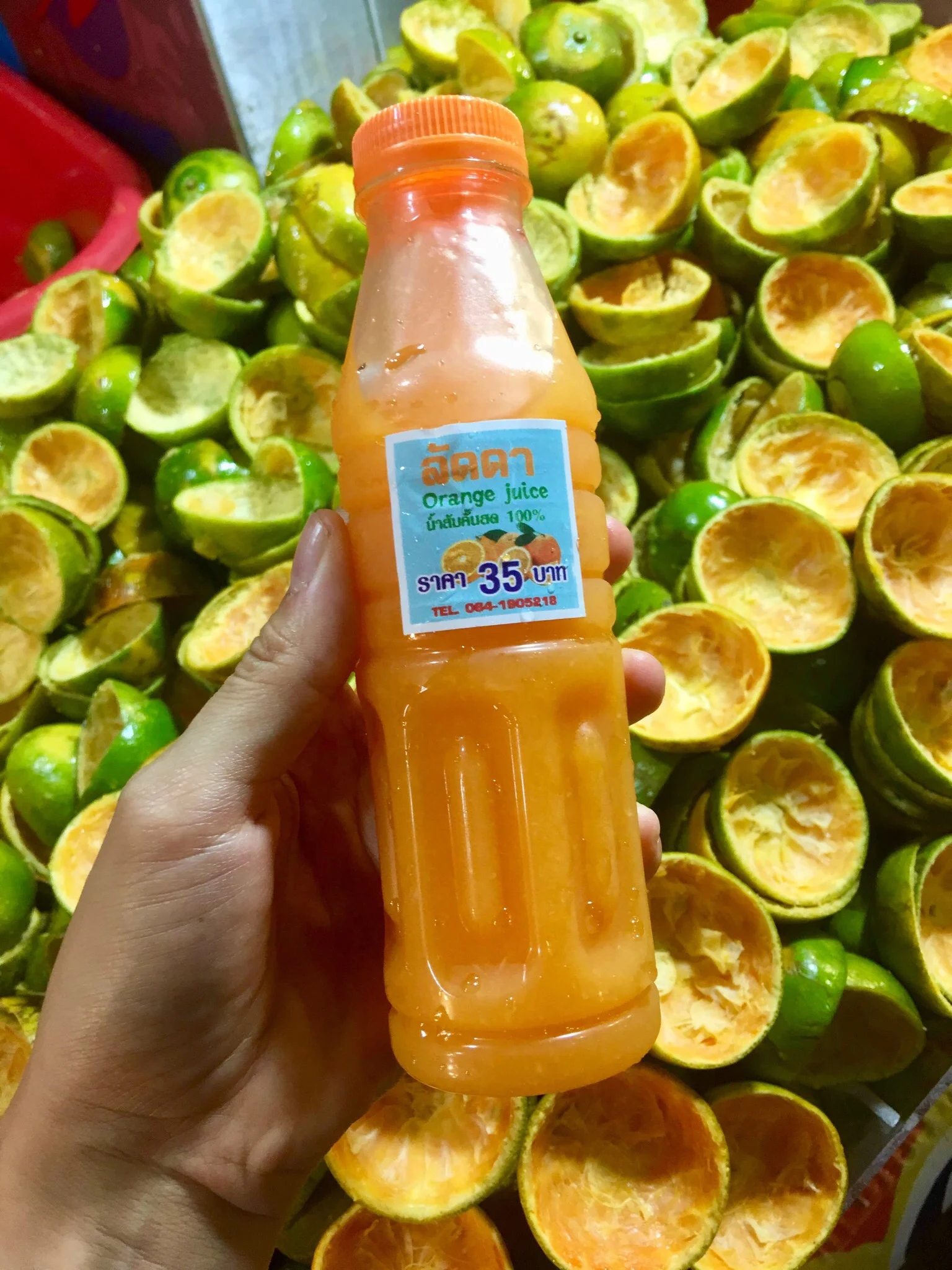 Freshly, freshly squeezed OJ. Lamai Beach Night Market, Koh Samui, Thailand.