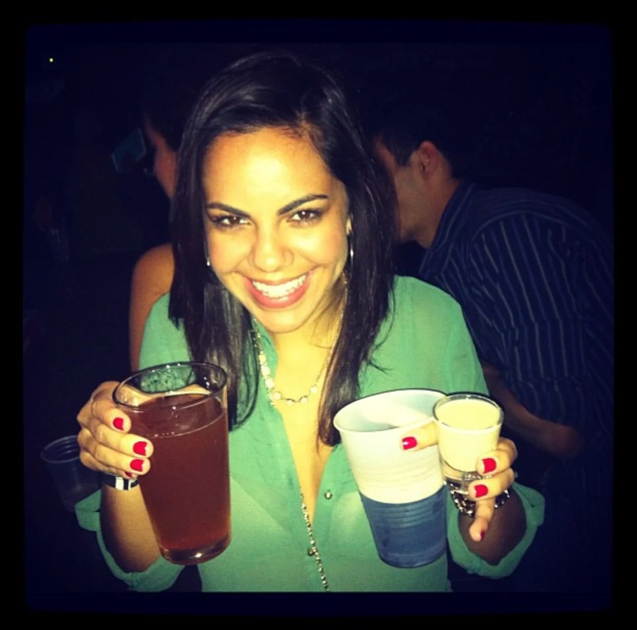 A Purple Haze in one hand and an Irish Car Bomb in the other. College in a pic.