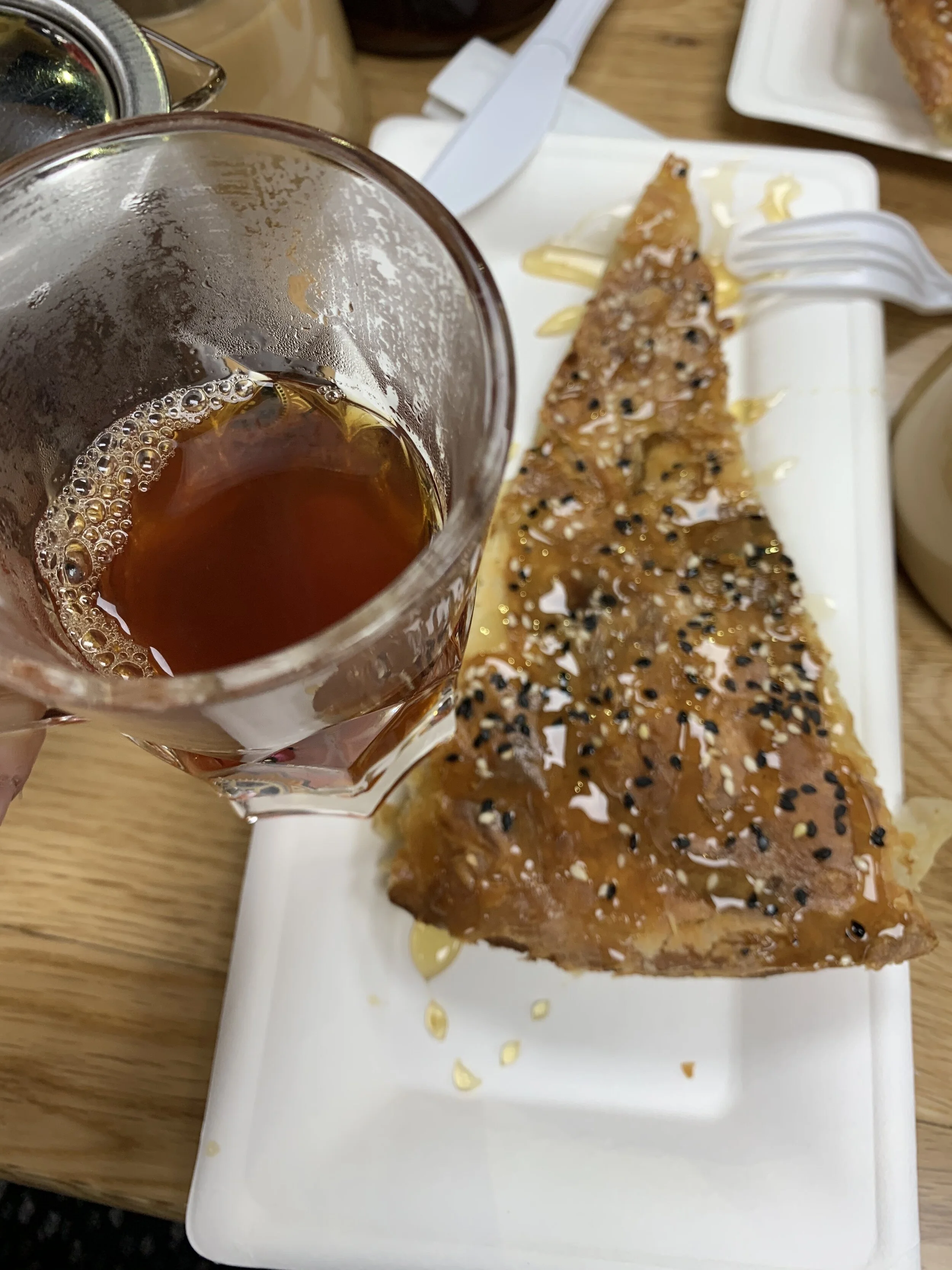 Traditional Yemini tea and dessert (sabaya, a flaky dessert reminiscent of blaklava drizzled with honey). At Qahwah House in Dearborn, MI.