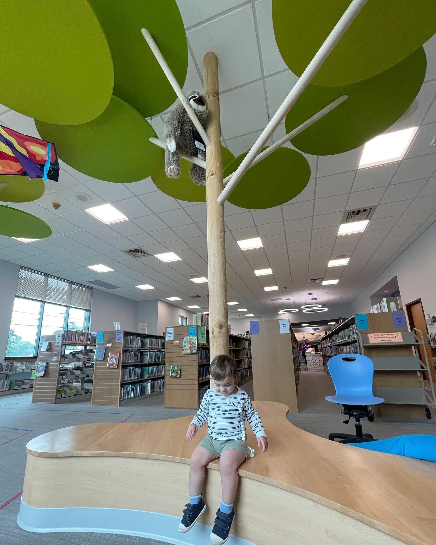 Our littlest team member enjoying the new @annalsangels children&rsquo;s corner INside @baldwinsvillepubliclibrary 📚🌳🦥🐨
.
.
#architecture #interiordesign #design #library #librarydesign #books #childrensbooks #project #projectcompletion #baldwins