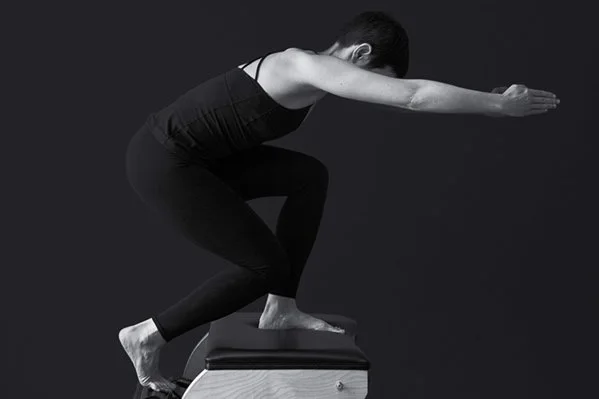 Hamstrings and Quads Work Together Strongly     Wunda Chair, Mat, Standing, Back of Leg/Co-Contraction 