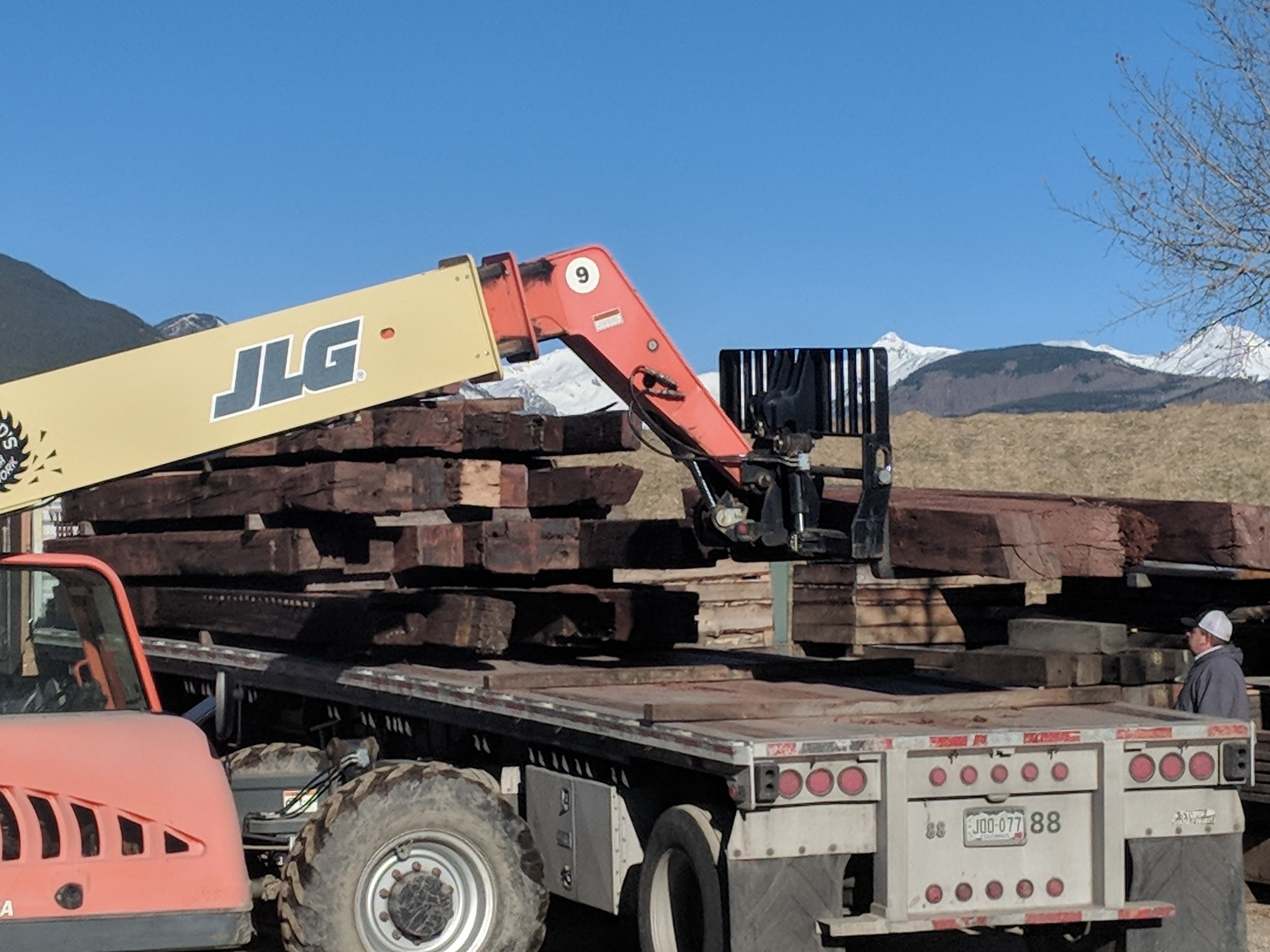 Unloading the Doug fir at our Crested Butte shop.