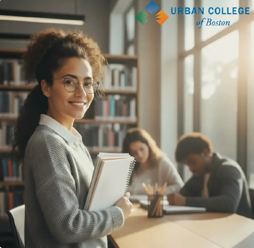 Urban College of Boston - Student and faculty in a library