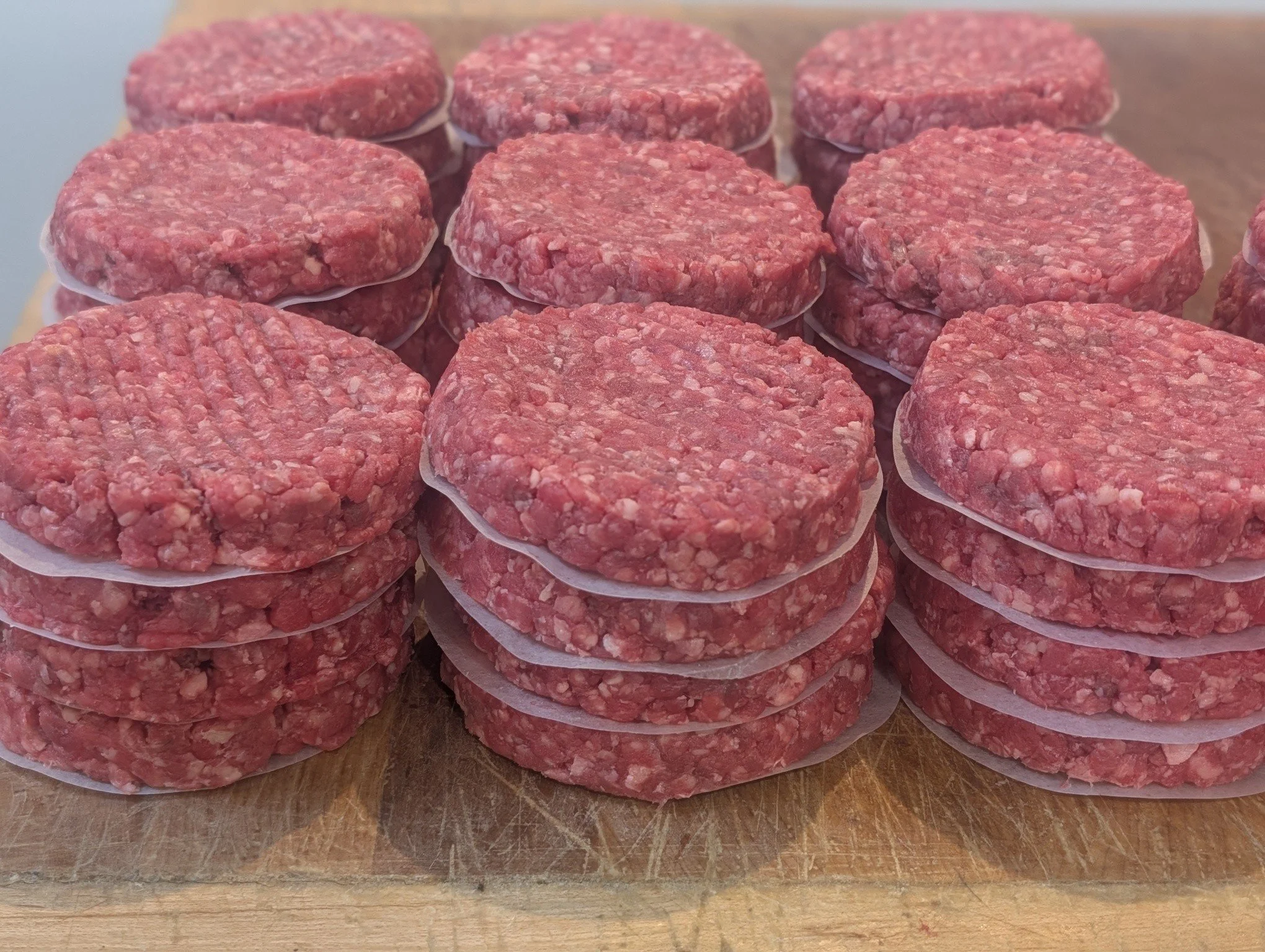🍔 Burgers on the block... pressed, stacked and ready to sizzle. 🔥

Whether you're firing up the BBQ today or planning an easy family supper, our handmade burgers are ready and waiting on the butchery counter. Just add your favourite toppings and en