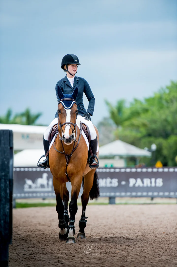 Jenn Gates and Everest De Muze at the 2016 Winter Equestrian Festival. Photo by Lucio Landa Photography.