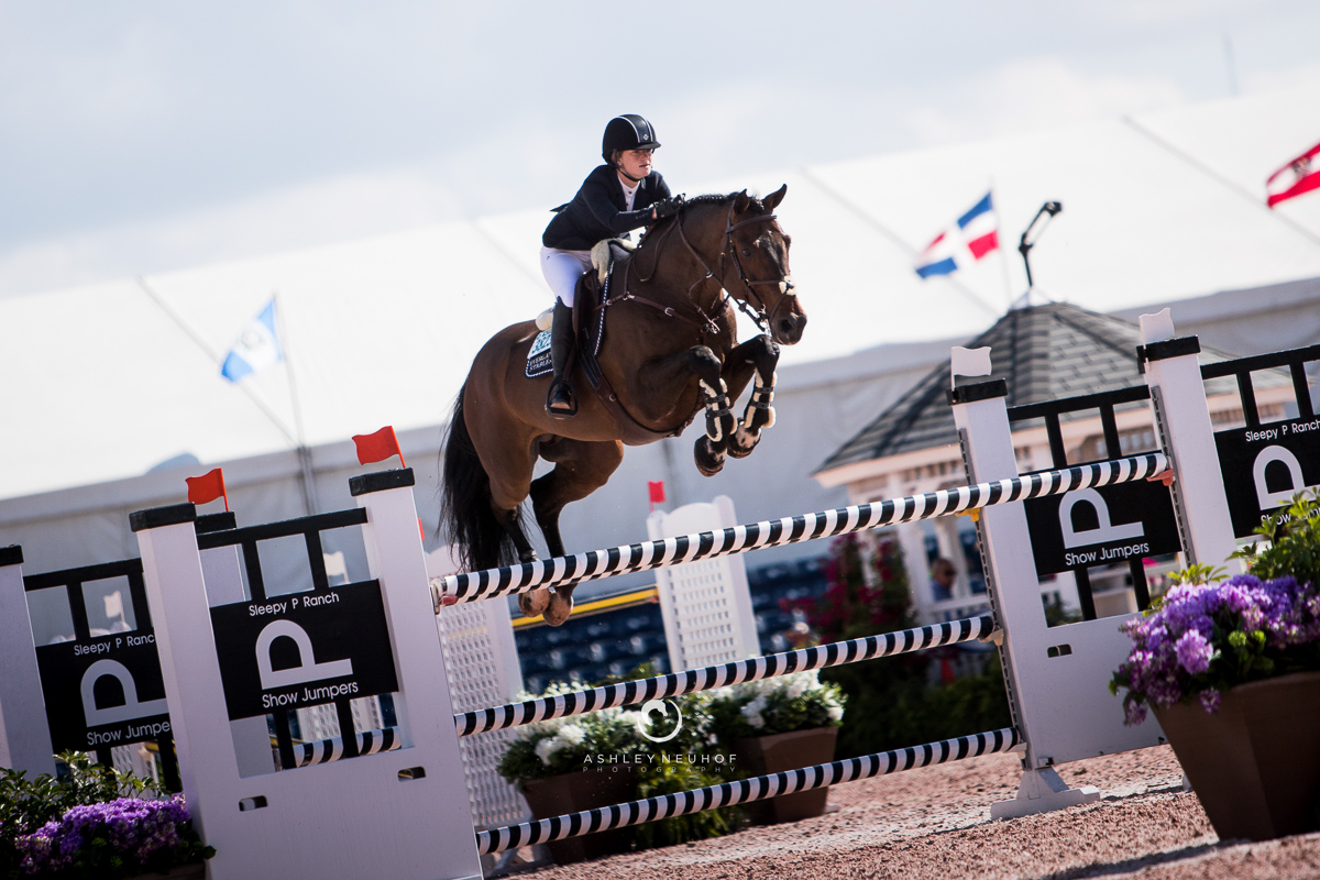 Jenn Gates and Capital Colnardo at Winter Equestrian Festival 2019. Photo by Ashley Neuhof Photography.