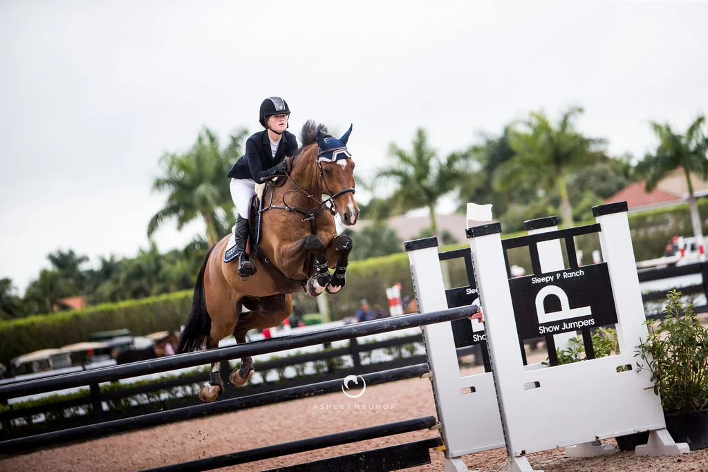Jenn Gates and Monaco at Winter Equestrian Festival 2019. Photo by Ashley Neuhof Photography.