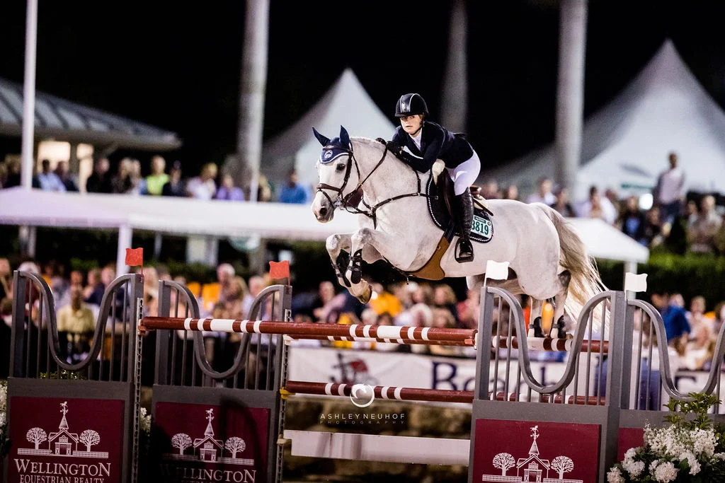 Jenn Gates and Pumped Up Kicks at Winter Equestrian Festival 2019. Photo by Ashley Neuhof Photography.