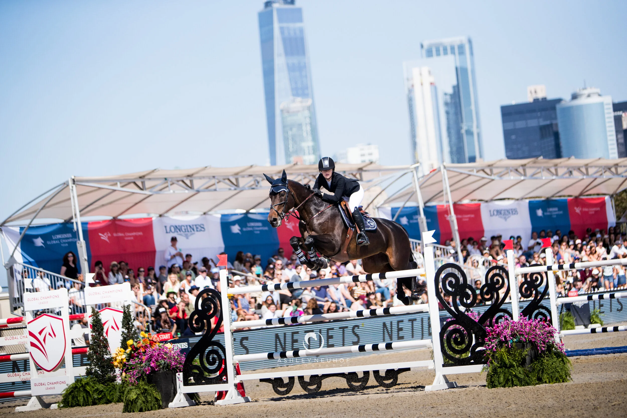 Jenn Gates and Dolinn at Longines Global Champions Tour of New York 2019. Photo by Ashley Neuhof Photography.