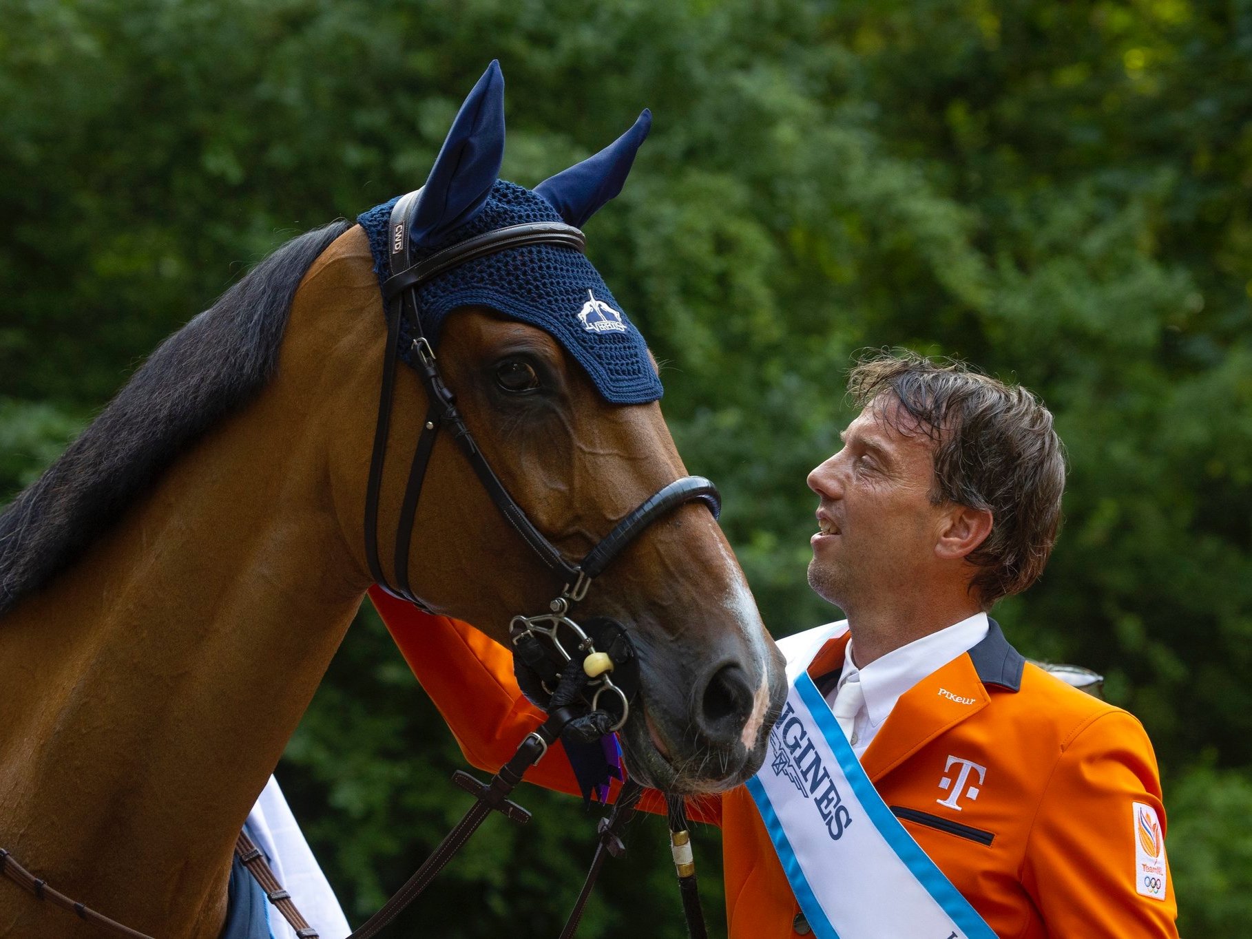  Harrie Smolders &amp; Monaco celebrating a 1st place finish with The Dutch team at the 2023 Longines FEI Jumping Nations Cup of The Netherlands. 