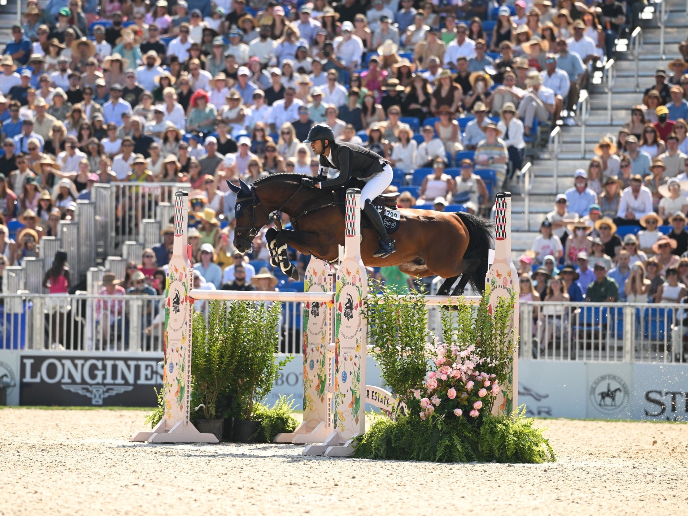  Nayel Nassar and Springfield competing in the CSI5* Grand Prix at the Hampton Classic. 