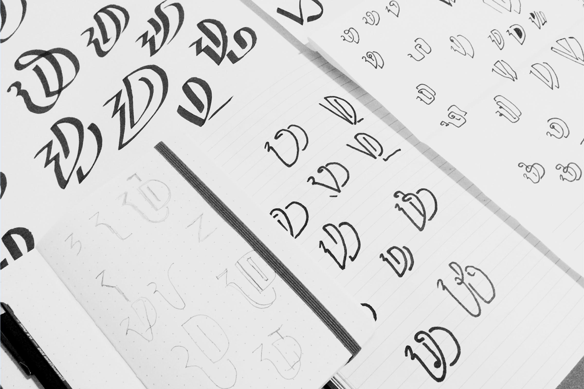 At the time, I was obsessed with logograms, and I thought it could be a good answer for what I was looking for. I made sketches on paper to check if the idea would works out, and at the end, it really did. I drew a few versions of it, expanded on my first direction and tightly applied geometry to craft a solid and elegant symbol. Based on the symbol, I generated many type-based patterns and a visual system inspired in basic colors and shapes.
