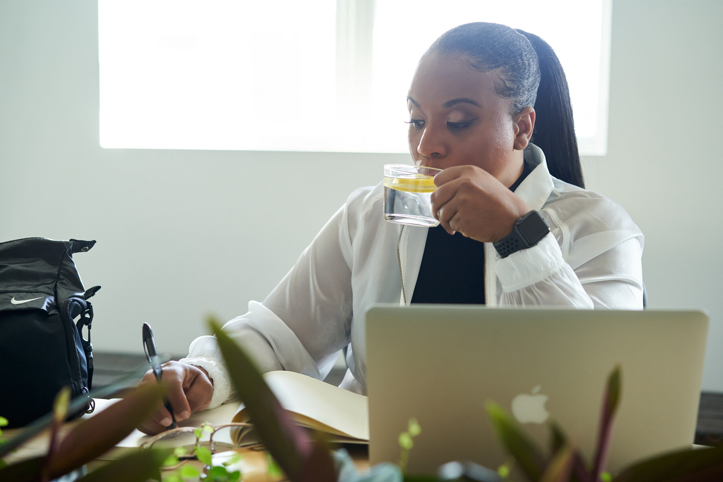 REC DRINKING LEMON WATER BOARD ROOM.jpg