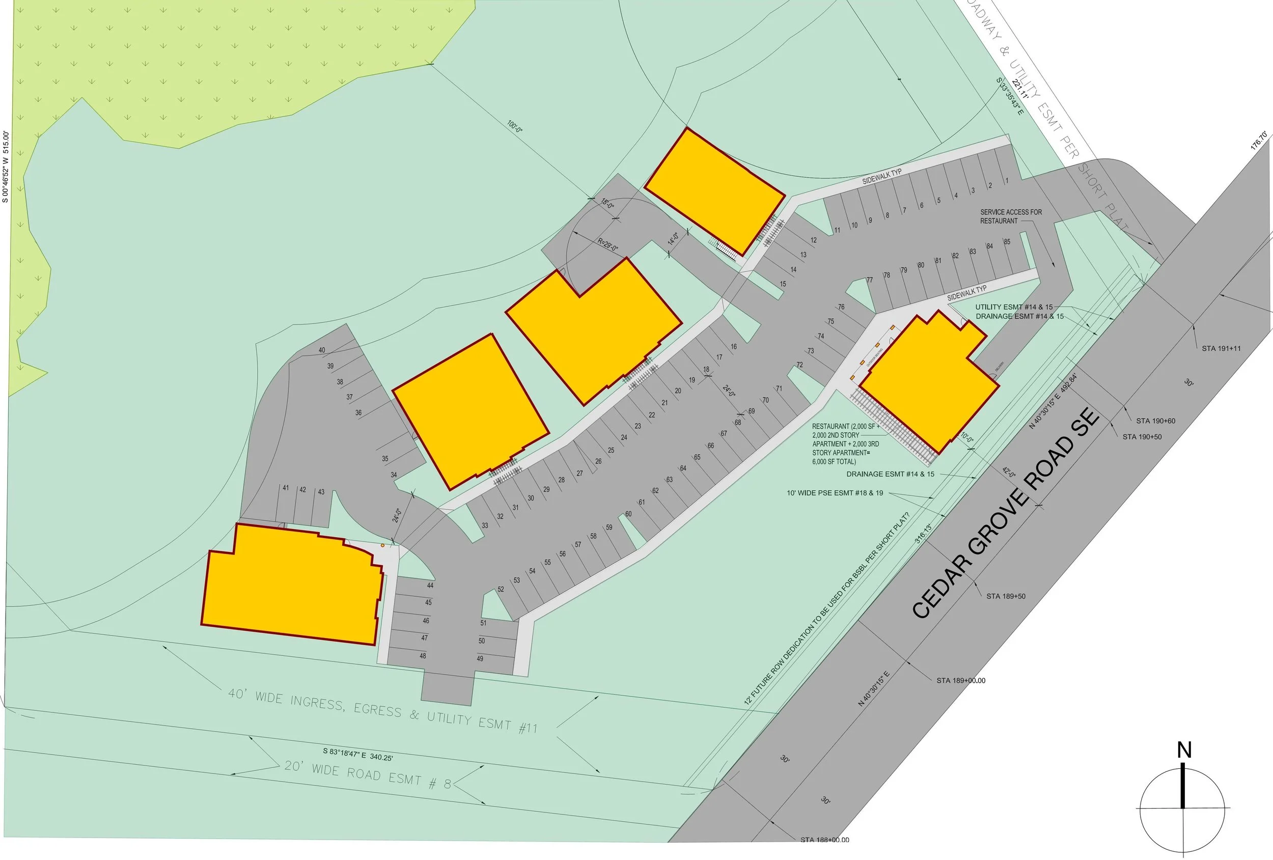 Overall site plan with buildings organized around open area (serves as septic drain field)