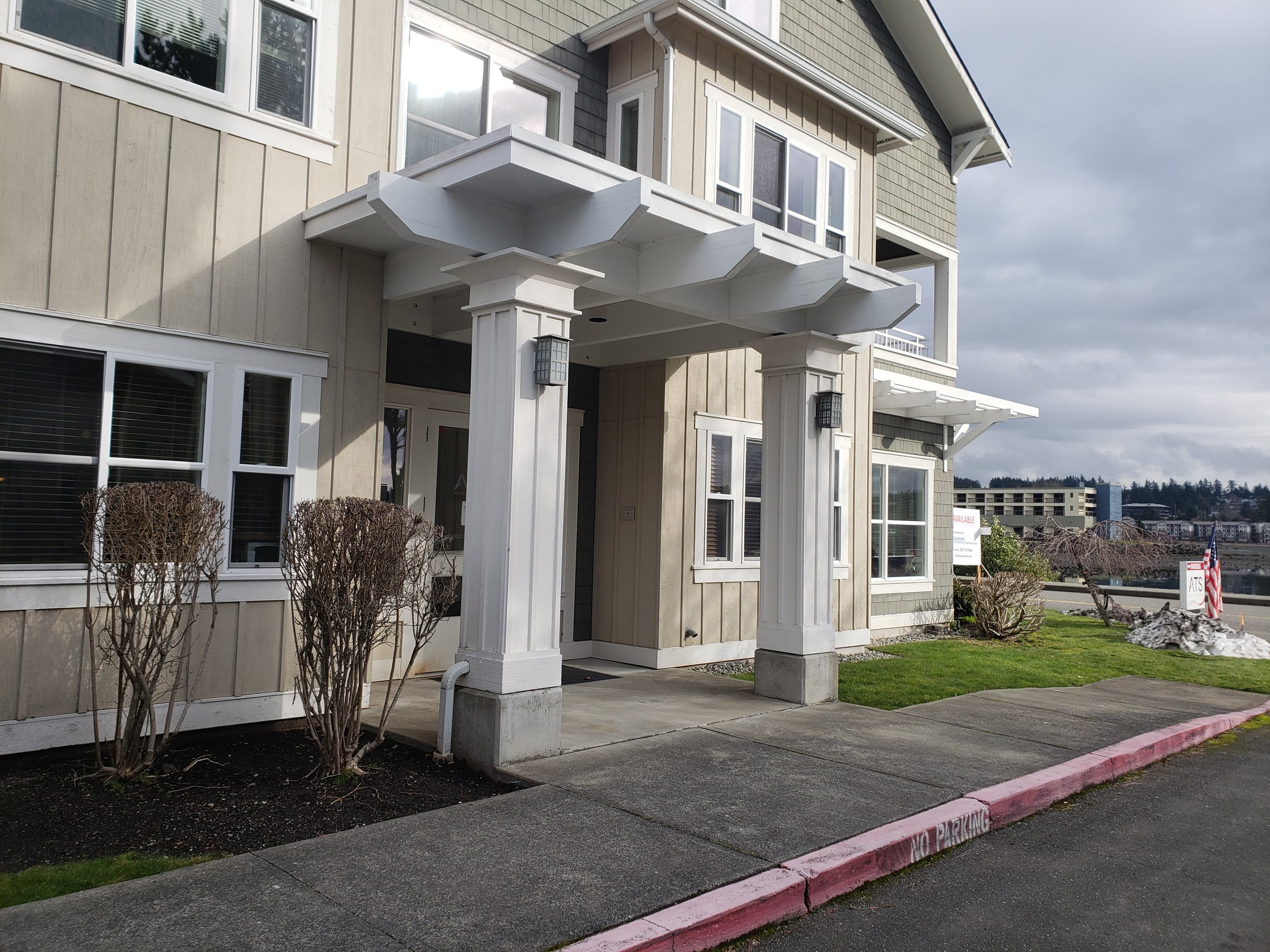 Main entry heavy timber decorative portico