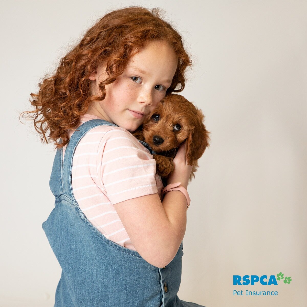 Red head girl and puppy - RSPCA Pet Ins..jpg