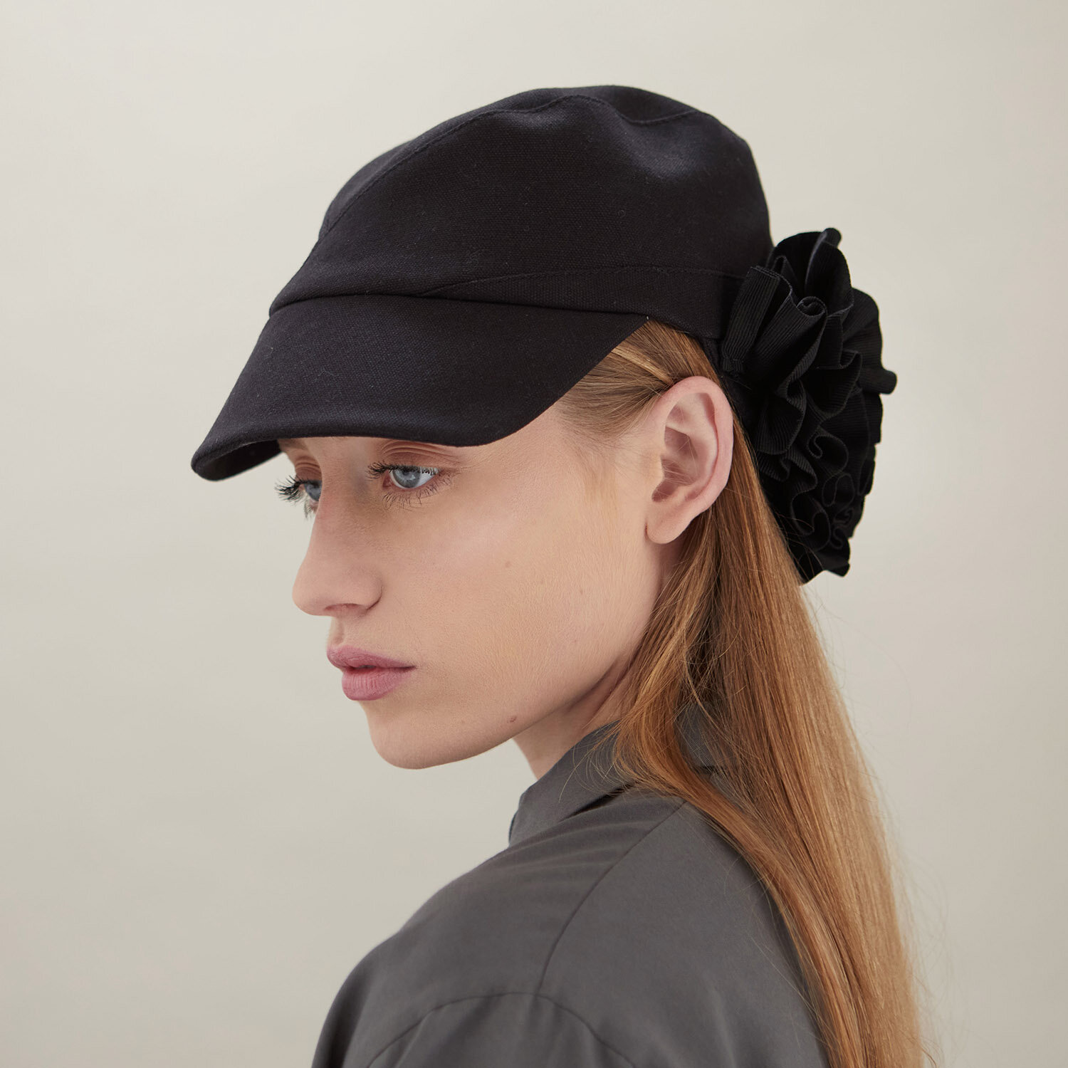   ‘Celeste’ peaked cap with ribboning detail.   Photo by James Champion 