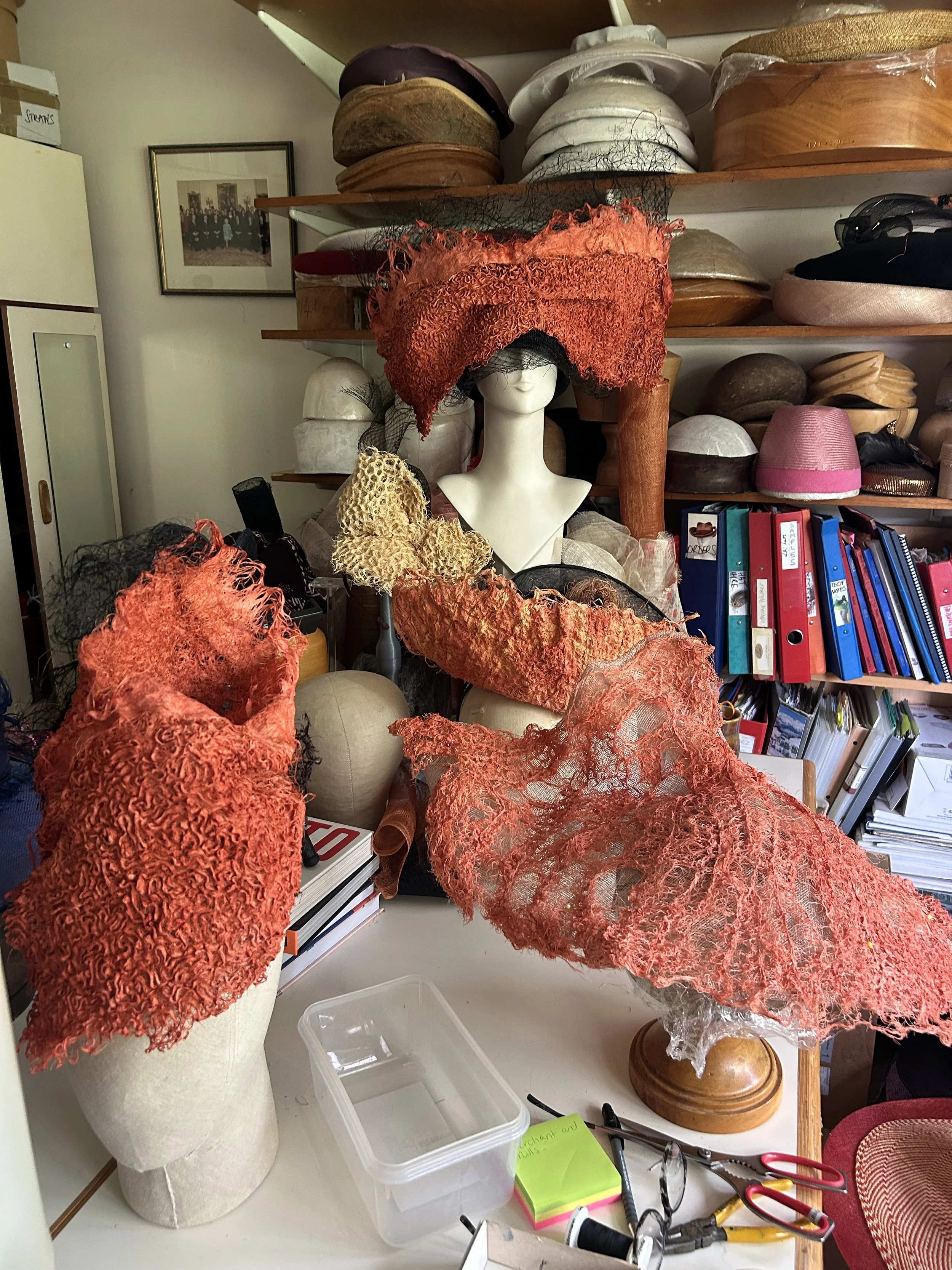 Lai Symes ROOT hat in studio.jpeg