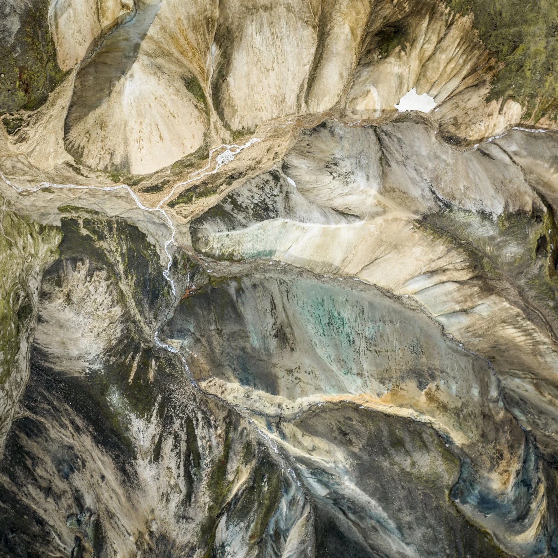 Elemental. Abstract landscape photograph of pale geological forms and subtle tonal variations, where scale and perspective become deliberately uncertain.