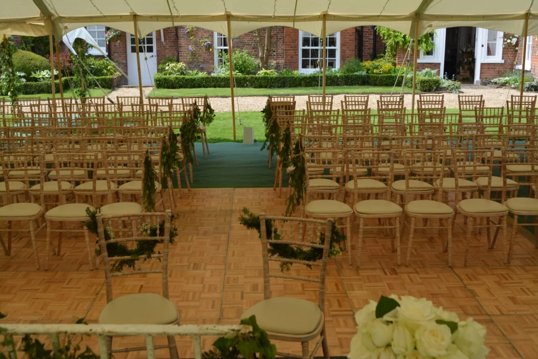 The blessing area was created by using the dance floor space during the day time, then clearing away the chairs while reception drinks were taken in the garden.